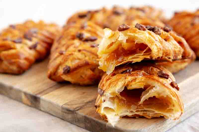 Homemade Maple Pecan Danish Pastry, side view. Close-up.