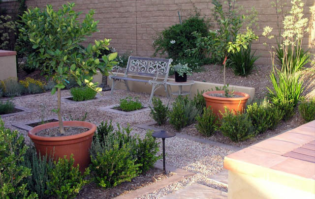 Garden ideas, Landscaping Ideas, Mediterranean garden, Mediterranean courtyard, terracota pots, gravel and stepping stones walkway, gravel and stepping stones path,boxwood,Studio H Landscape,container plants,formal,garden bench,geometric,geometry,gravel,g